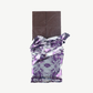 A picture of a 3 ounce Vosges chocolate bar unwrapped.