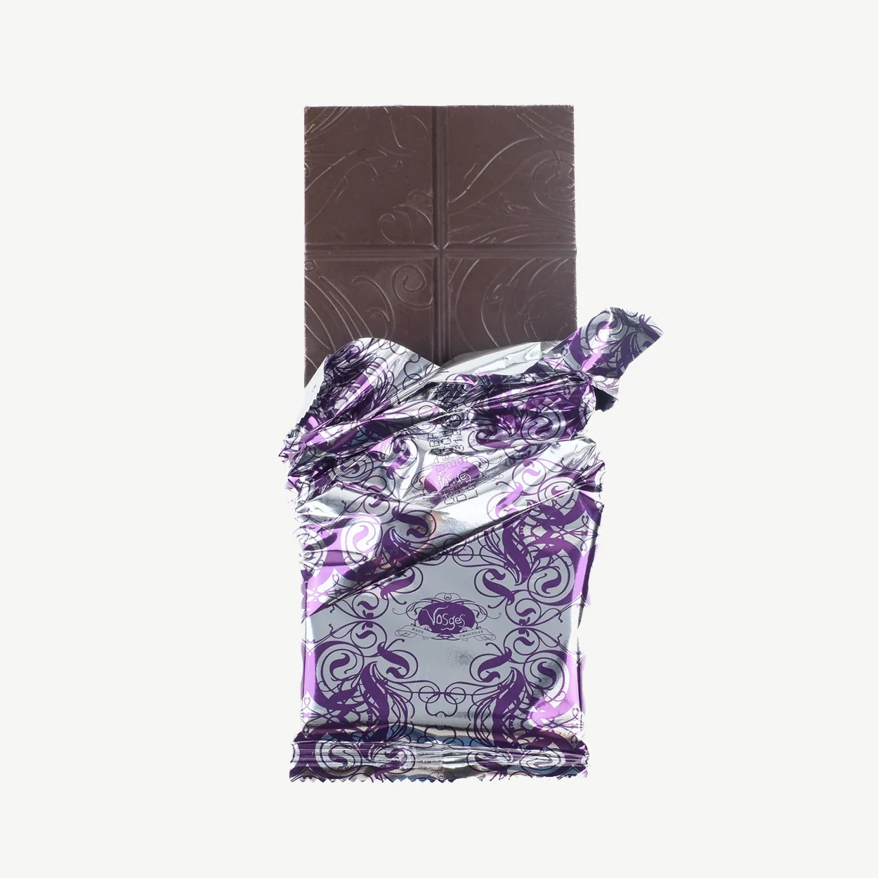 A picture of a 3 ounce Vosges chocolate bar unwrapped.