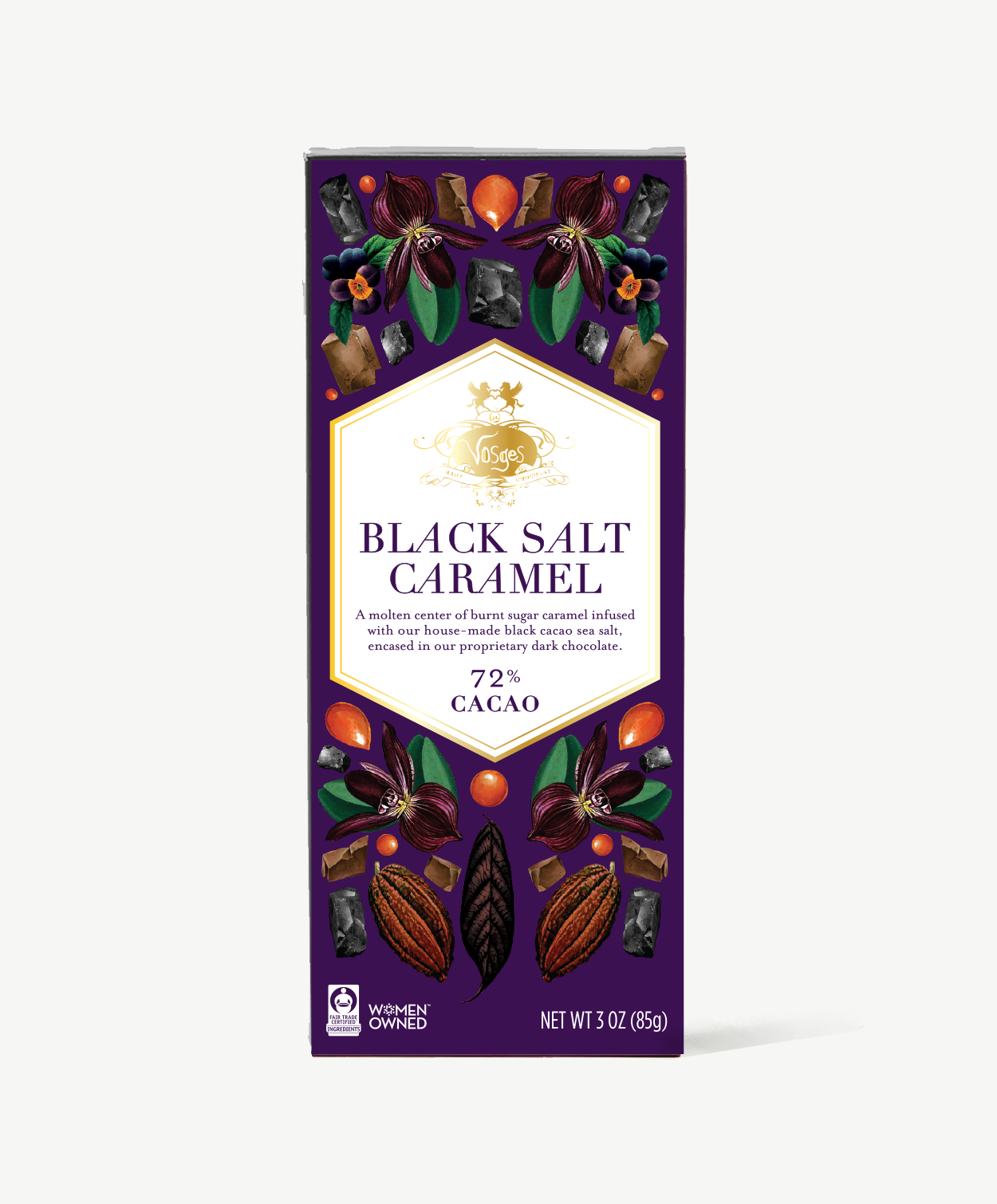 Vosges Black Salt Caramel bar stands upright displaying a purple box wrapper featuring illustrations of crystals and cacao pods on a grey background.